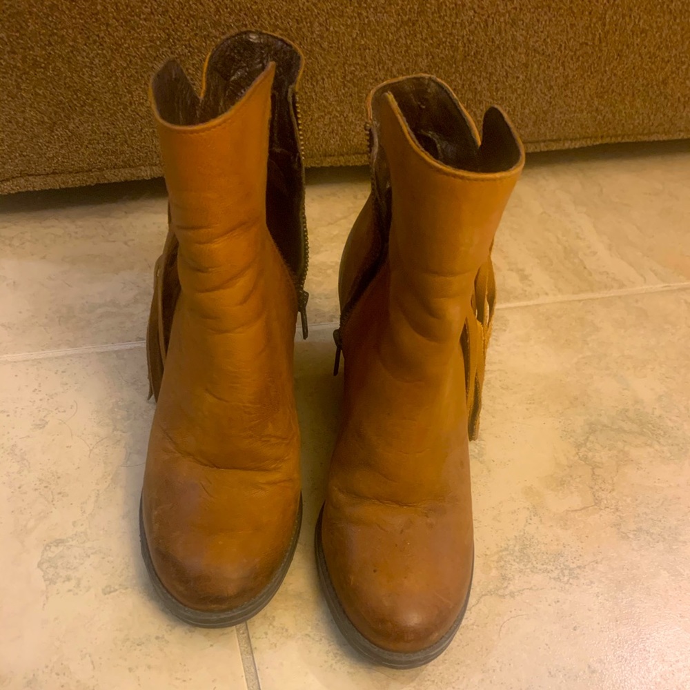 Tan fringe booties